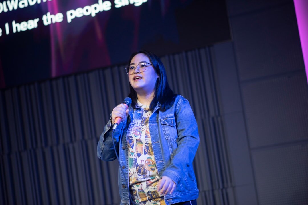 confident speaker on stage