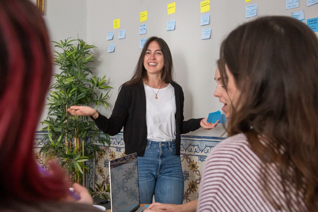 woman presenting to team