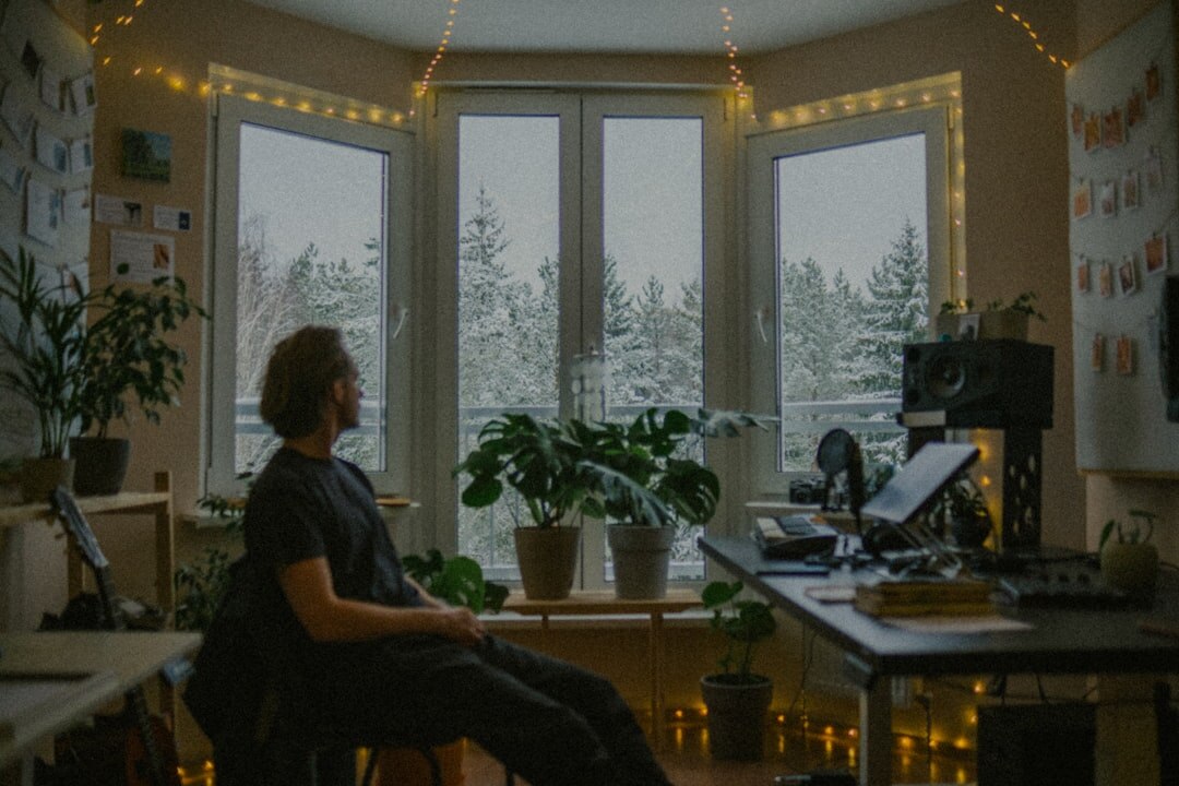 man reflecting in quiet office